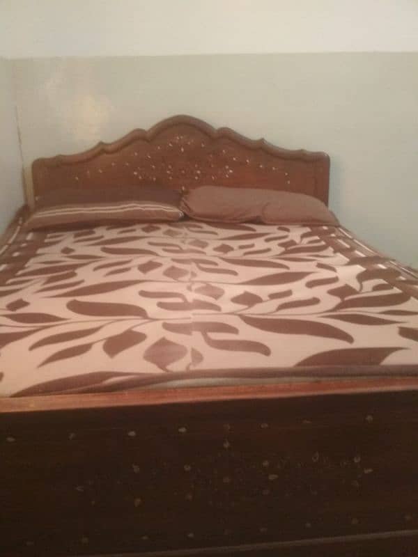 pure wooden double bed with 5 foot width 4