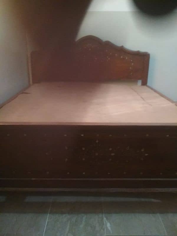 pure wooden double bed with 5 foot width 5