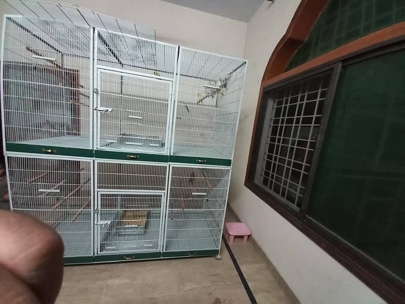 3 cages 5 portion conditions new with pots and sticks (big avairy 1