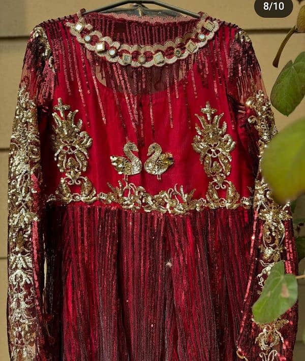 A beautiful mahroon maxi fully covered with sequence and sitara 4