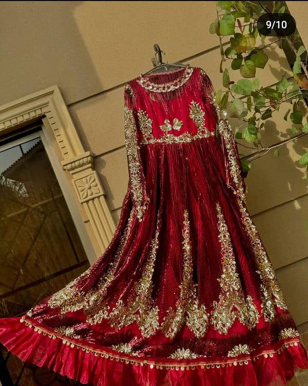 A beautiful mahroon maxi fully covered with sequence and sitara 6