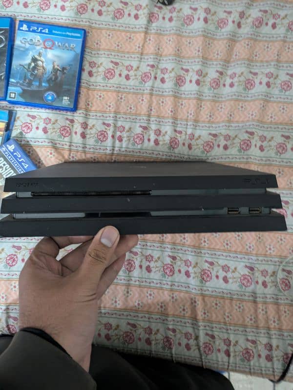 PS4 pro 1TB sealed never opened 3-4 games installed with 5 cd's 1