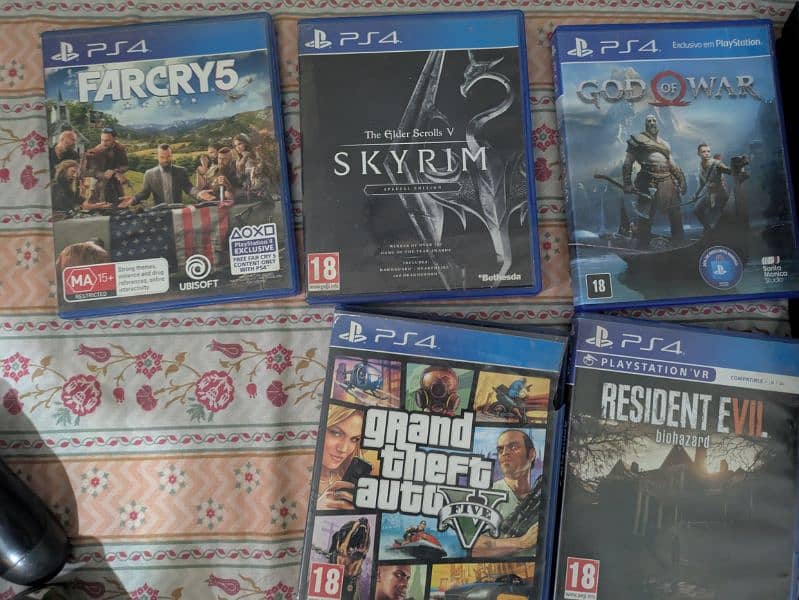 PS4 pro 1TB sealed never opened 3-4 games installed with 5 cd's 3