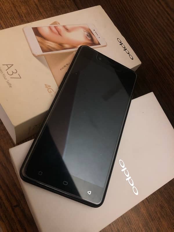 Oppo A37fw black 2/16 one hand used sealed. 1