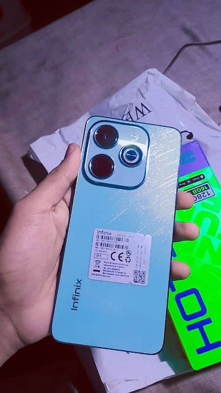 Infinix hot 40i 8 _256 with box 10/10 condition full ok 5