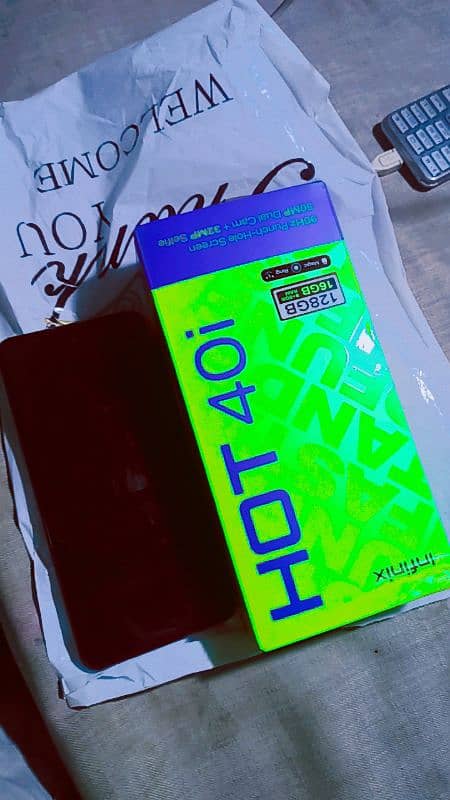 Infinix hot 40i 8 _256 with box 10/10 condition full ok 7