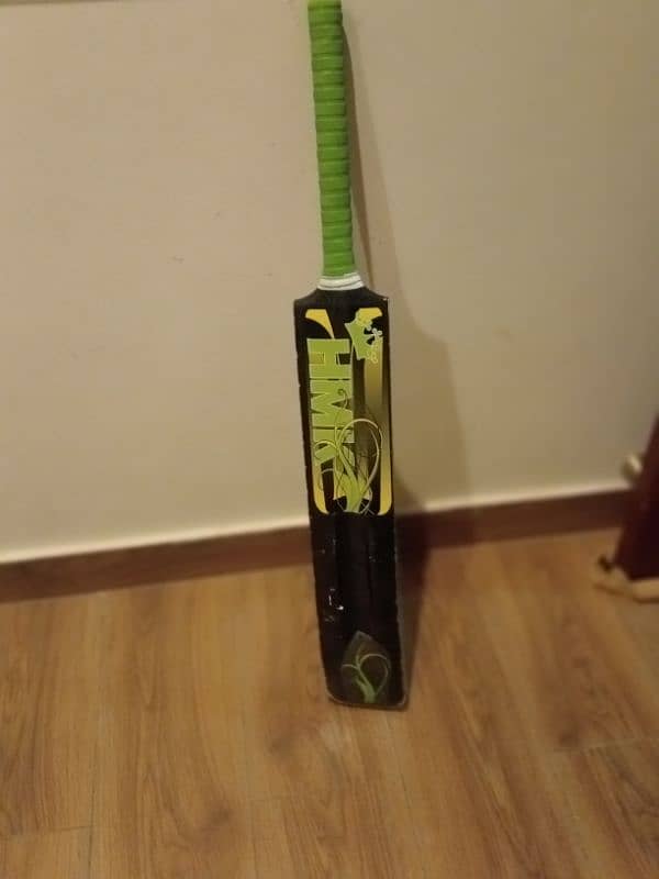 Cricket tape ball bat 1