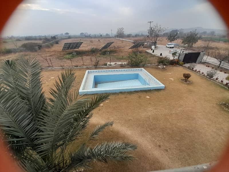 Beautiful 65 Kanal Farm House Available For Sale In Banda Nagyal Dhamyal Road. 26