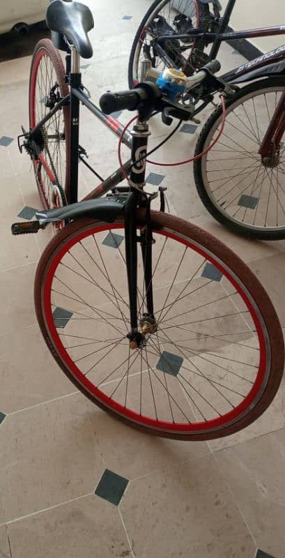 hybrid cycle very slim tyres almost new bicycle with Shimano gears 1
