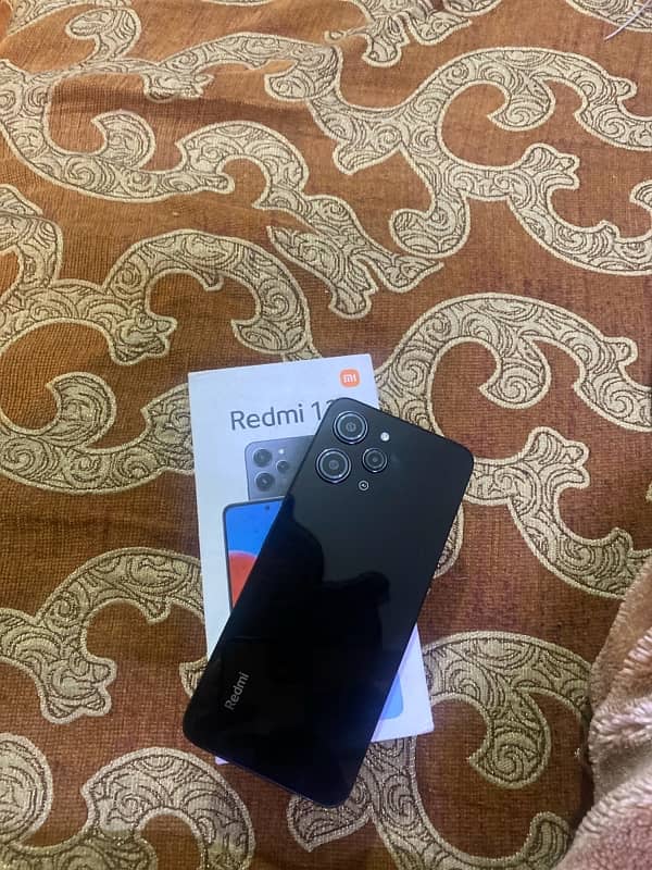 A black redmi mobile 8/128 0