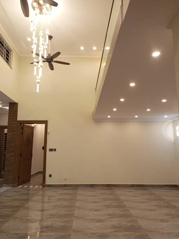 9.75 marla corner designer house, 5 bedrooms with attached baths one drawing room 2 tv 1