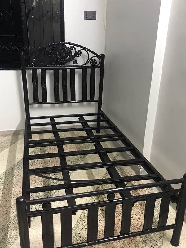 black iron single bed 1