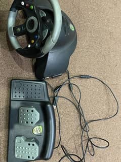 Mad catz 2 racing wheel and pedal for xbox 360 (WhatsApp only)