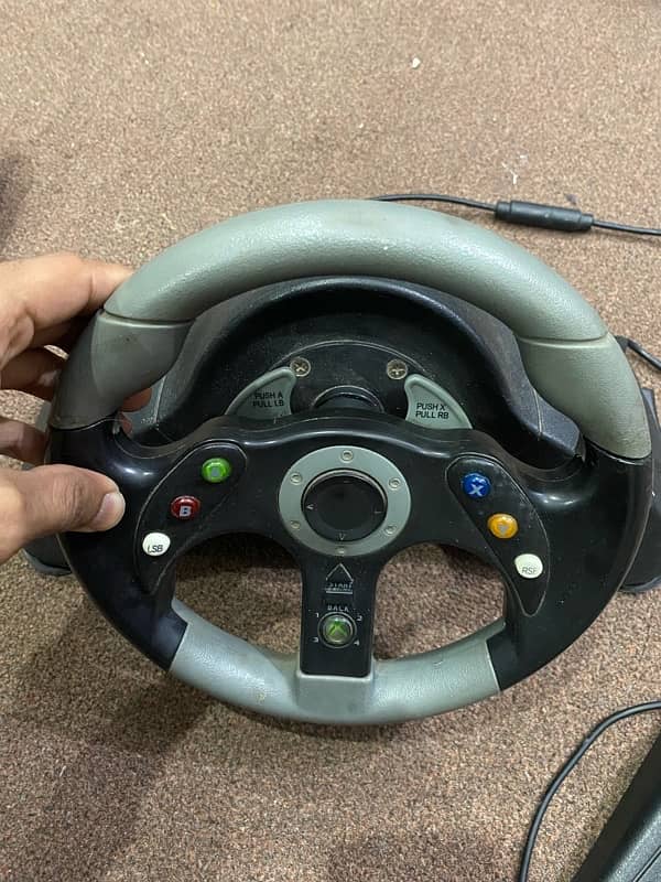 Mad catz 2 racing wheel and pedal for xbox 360 (WhatsApp only) 1