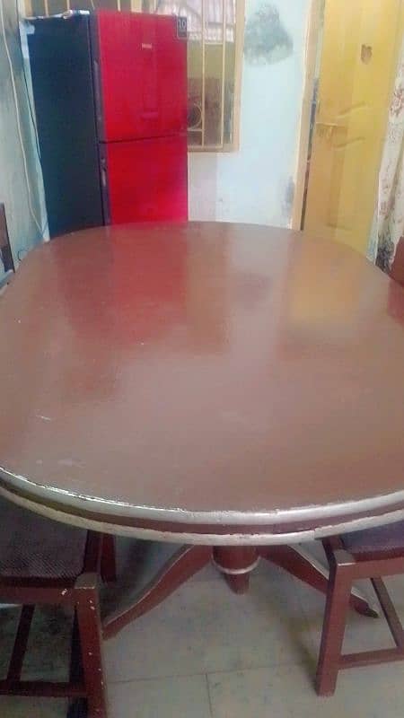 6 seater wooden dining table in good condition 1