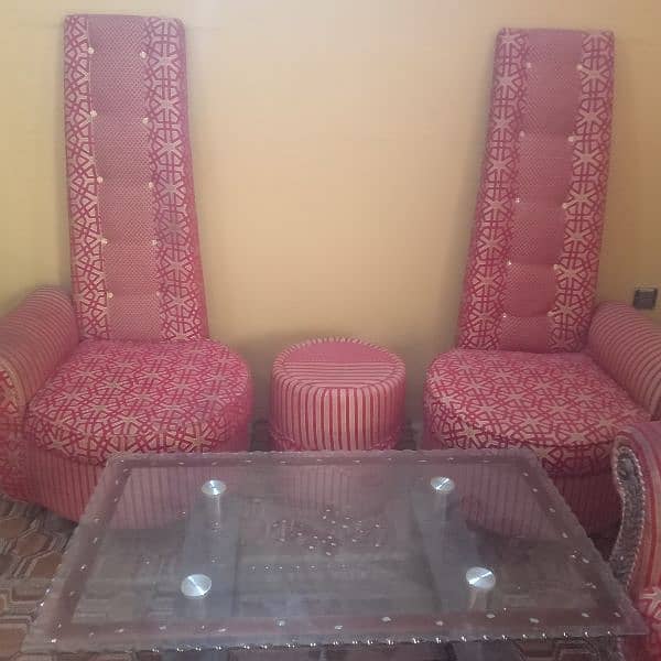 7 seater sofa and one glass table and one side table and one die box 2