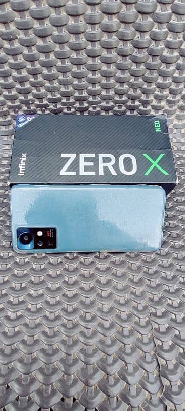 infinix zero x neo 10/10 with charger and box 1