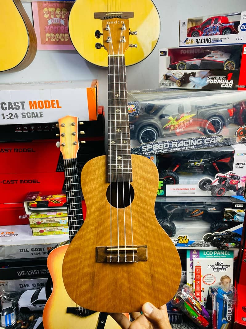 Ukulele Mahogany wood 24 inch concert size (brand new) 0