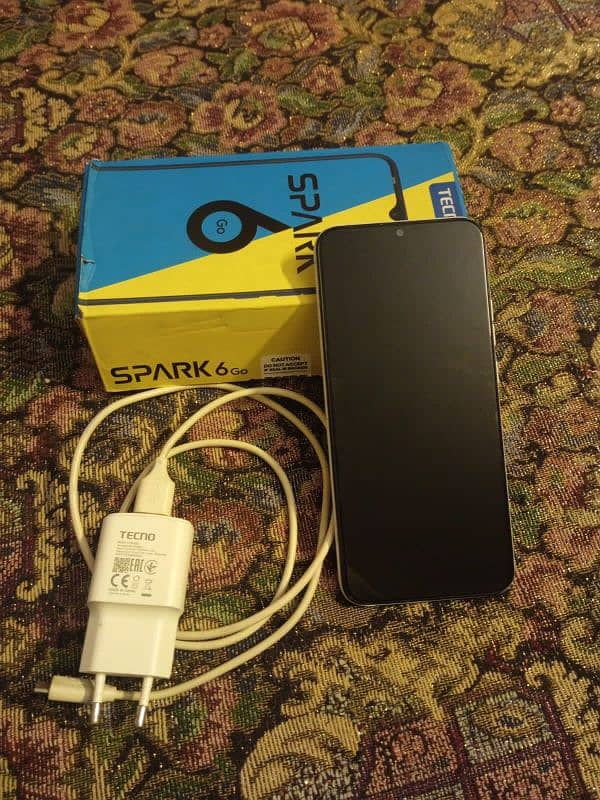 Tecno Spark 6 Go Mobile with Box and Charger 1