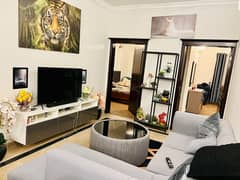 Beautiful Luxury Fully Renovated Fully Furnished 2 Bed 2 Bath TV Lounge Kitchen Car Parking Apartment Available For Rent In F-11 Markaz Islamabad