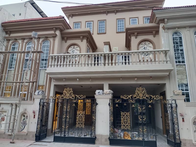 5 Marla Brand New Beautiful or Spanish House Near Emporium Mall Solid Construction A+++ Gated Area Near Park Market And Mosque Near to Main Bouleward 1