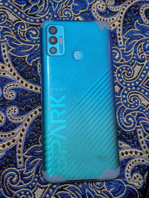 Tecno Spark 7. T 1