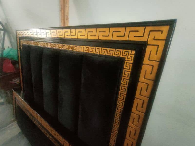 Golden black double bed with posish 5