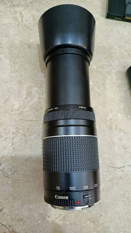 canon 75-300mm iii lens with cap & hood 0