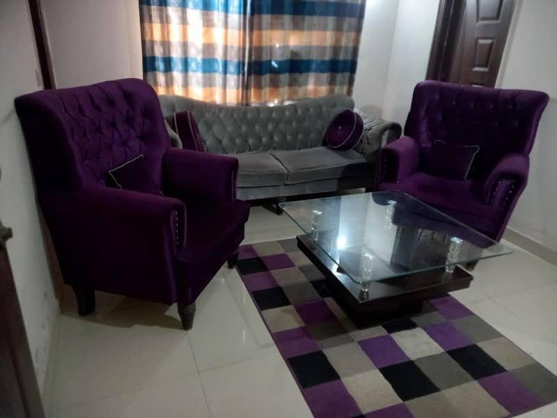 5 seater sofa set along with table and cushions 1