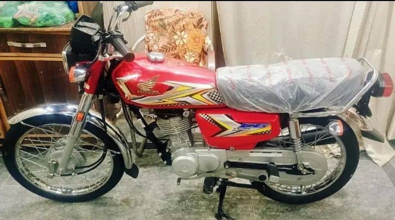 Honda 125 2024 model hai 25 stikr number lga hai all original 0