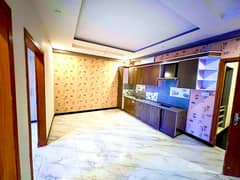 2 BED LUXURY BRAND FLAT FOR SALE F-17 ISLAMABAD ALL FACILITY AVAILABLE CDA APPROVED