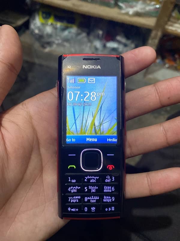 Nokia x200 open boxs hau boxs ni hai charging sath mil jai gua 1