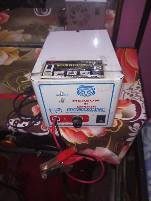 Battery Charger Full Automatic New Condition. 3