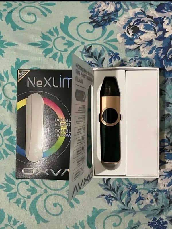 oxva nexlim pod with box and extra pack coil only 2 days used 1