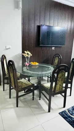 6 seater round Glass dining table with 6 chairs