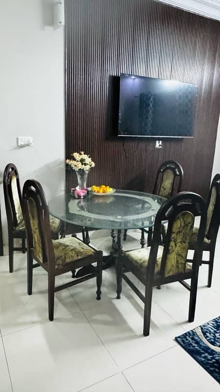 6 seater round Glass dining table with 6 chairs 0