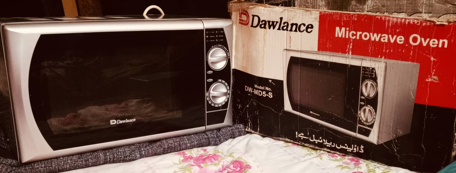 "Slightly Used Dawlance MW  – 700W, PKR 12,000!" 1