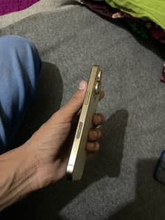 i am selling my ipne 13pro gold colour