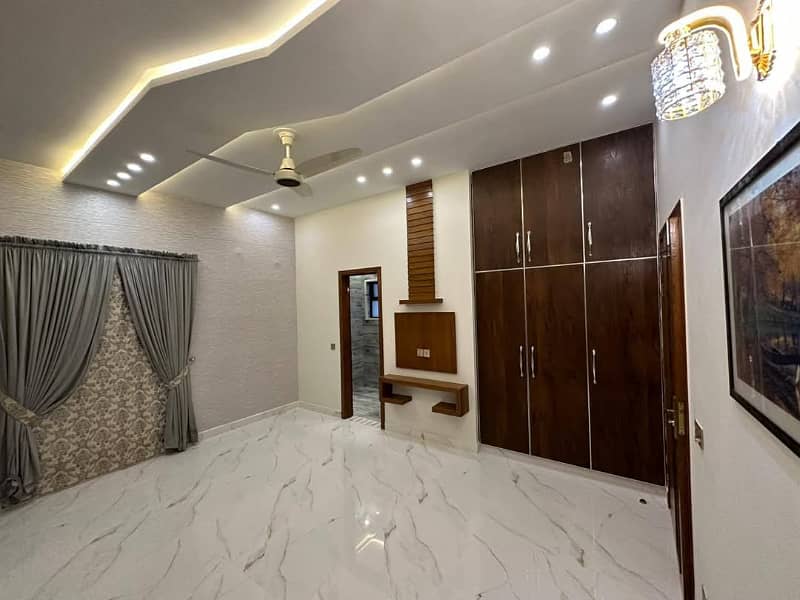 10 marla brand new house available for rent in johar block sector F bahria town lahore 13