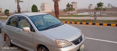 Suzuki Liana 2010 . . Automatic . AC . Engine. Suspension Excellent car