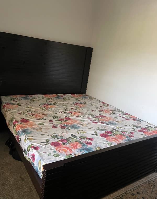 wooden bed with 2 side tables and mattress 4