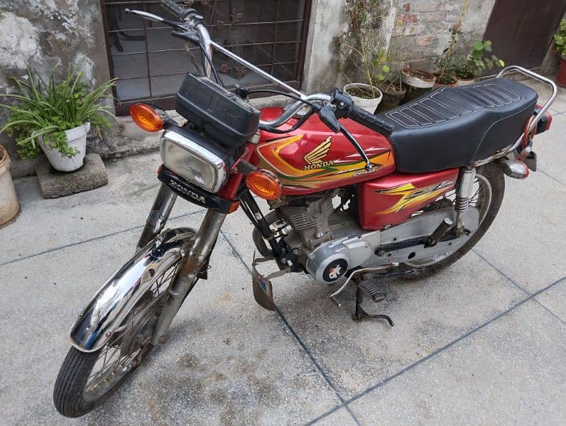 united 125 bike us euro-2 red colour Lahore number good condition 4