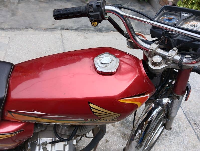 united 125 bike us euro-2 red colour Lahore number good condition 13