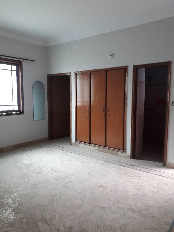 three bed dd first floor portion with roof for rent in johar 4