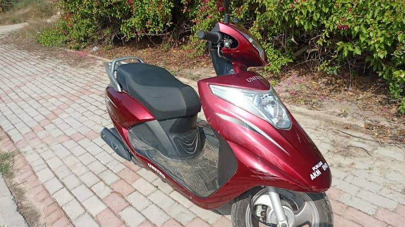 united Scooty 100 cc 1