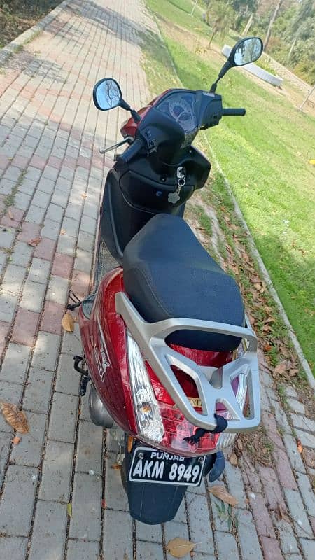 united Scooty 100 cc 7