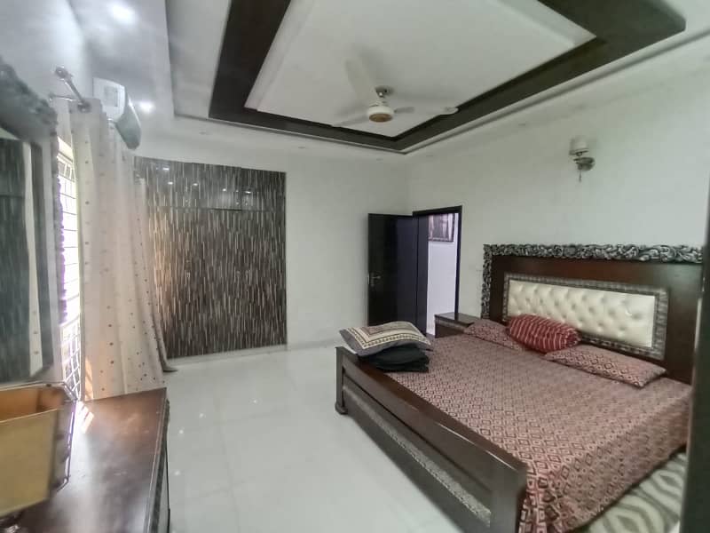 One Kanal Used Modern Design Bungalow For Sale At Prime Location Of DHA Lahore Near To Park masjid & Commercial Market. 24