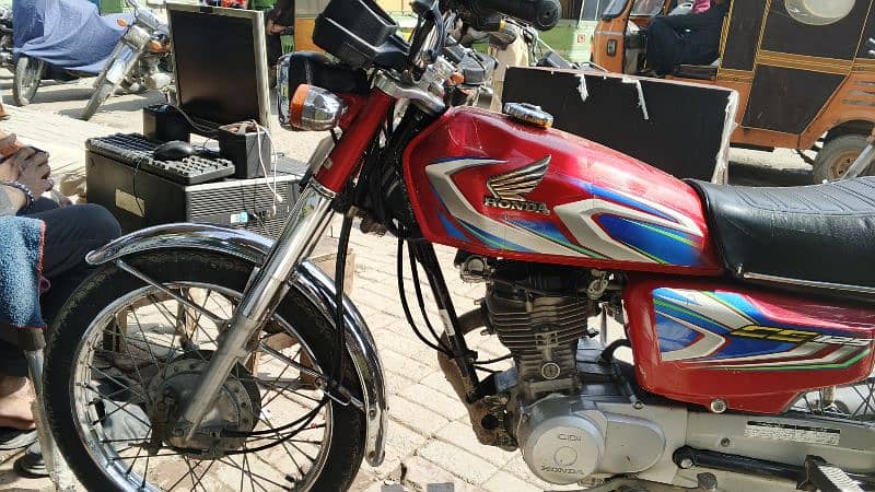 Honda 125 Red color 2019 was number in model 21 10