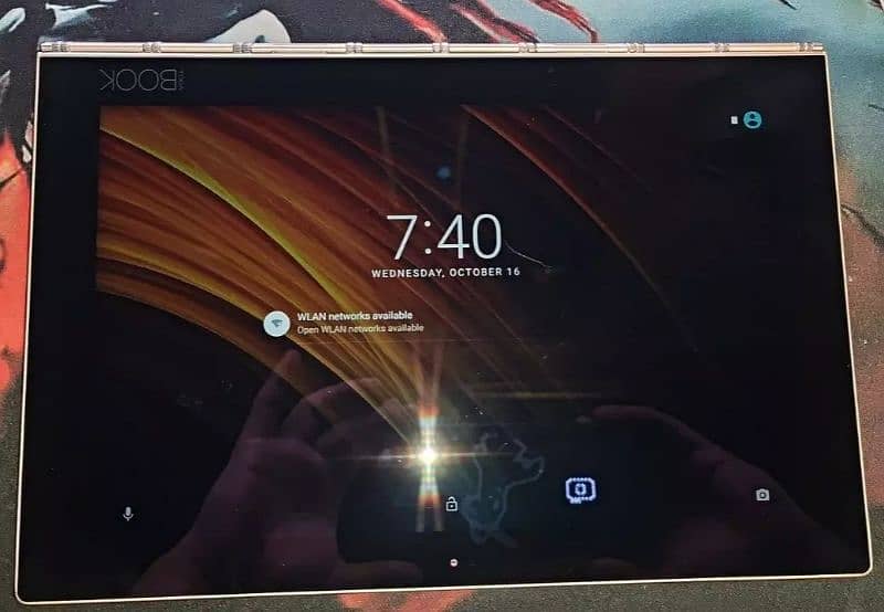 The Lenovo Yoga Book YB1-X90F Tab 4G+64GGR-US is a 2-in-1 tablet 4