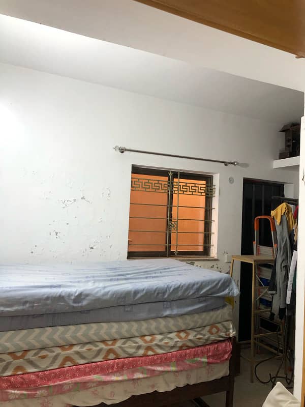 DHA LAHORE PHASE-4 5-BedRoom 2-Kitchens 2-Servant-Quarters Good Condition House at Prime Location 25